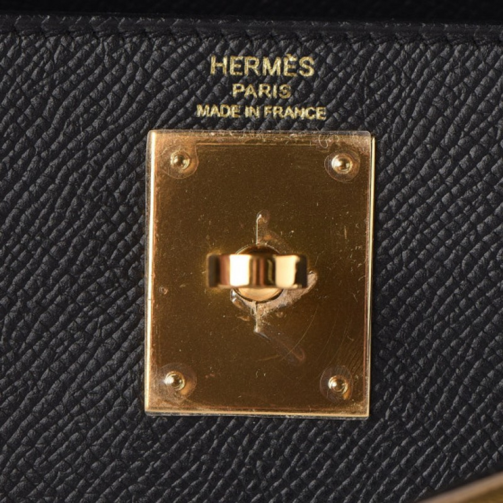 Hermès – Bolso Kelly 25 en negro con herrajes dorados