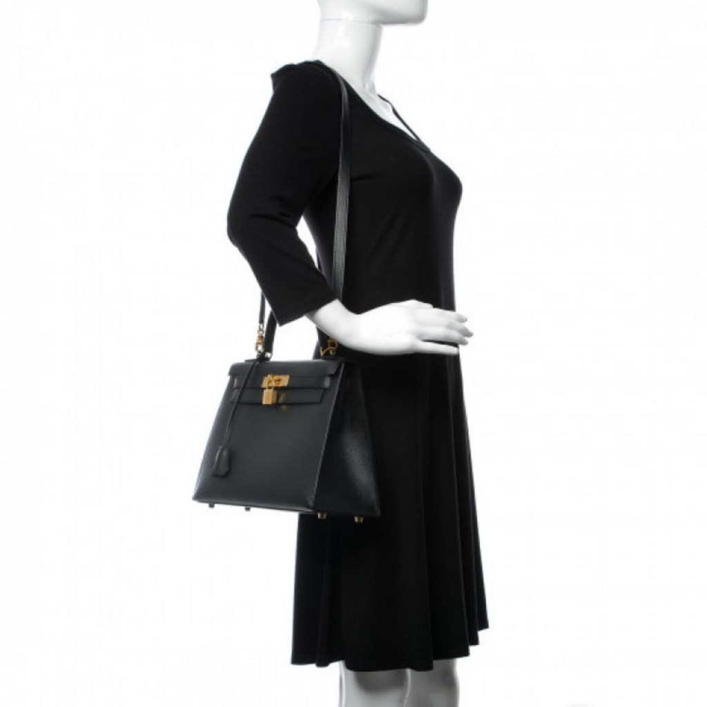 Hermès – Bolso Kelly 25 en negro con herrajes dorados