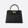 Hermès – Bolso Kelly 25 en negro con herrajes dorados